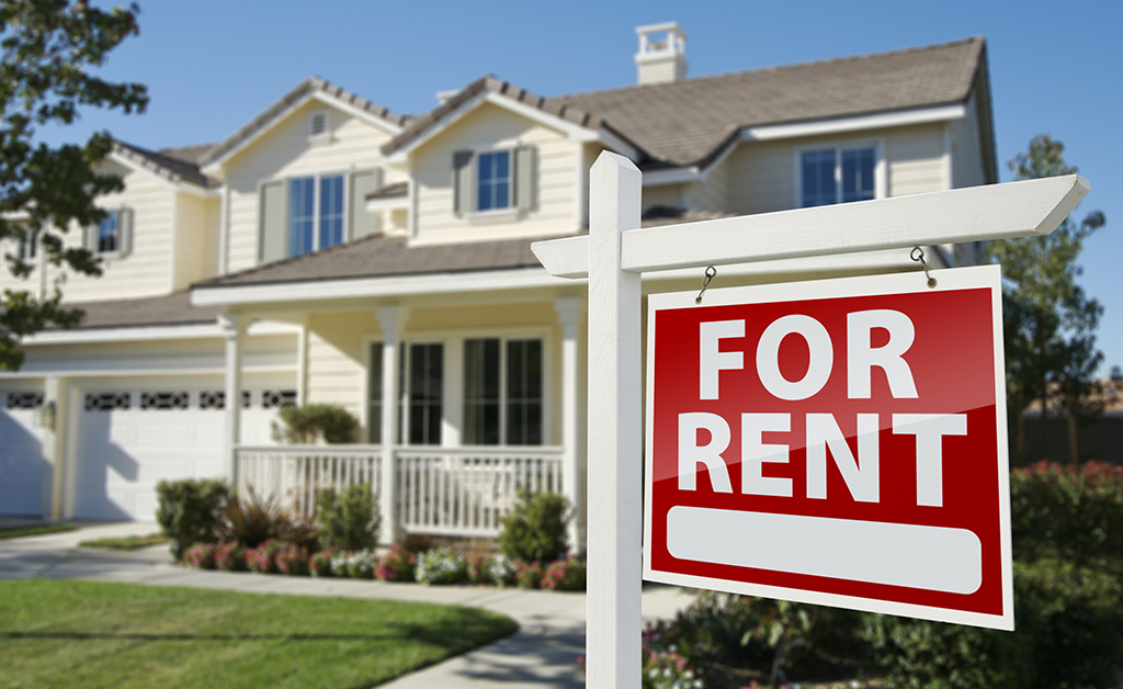 Beautiful house with FOR RENT sign